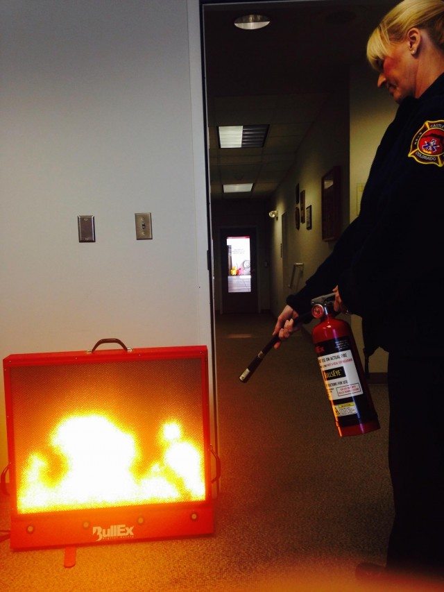 educator/inspector, christine jenkins, using the fire